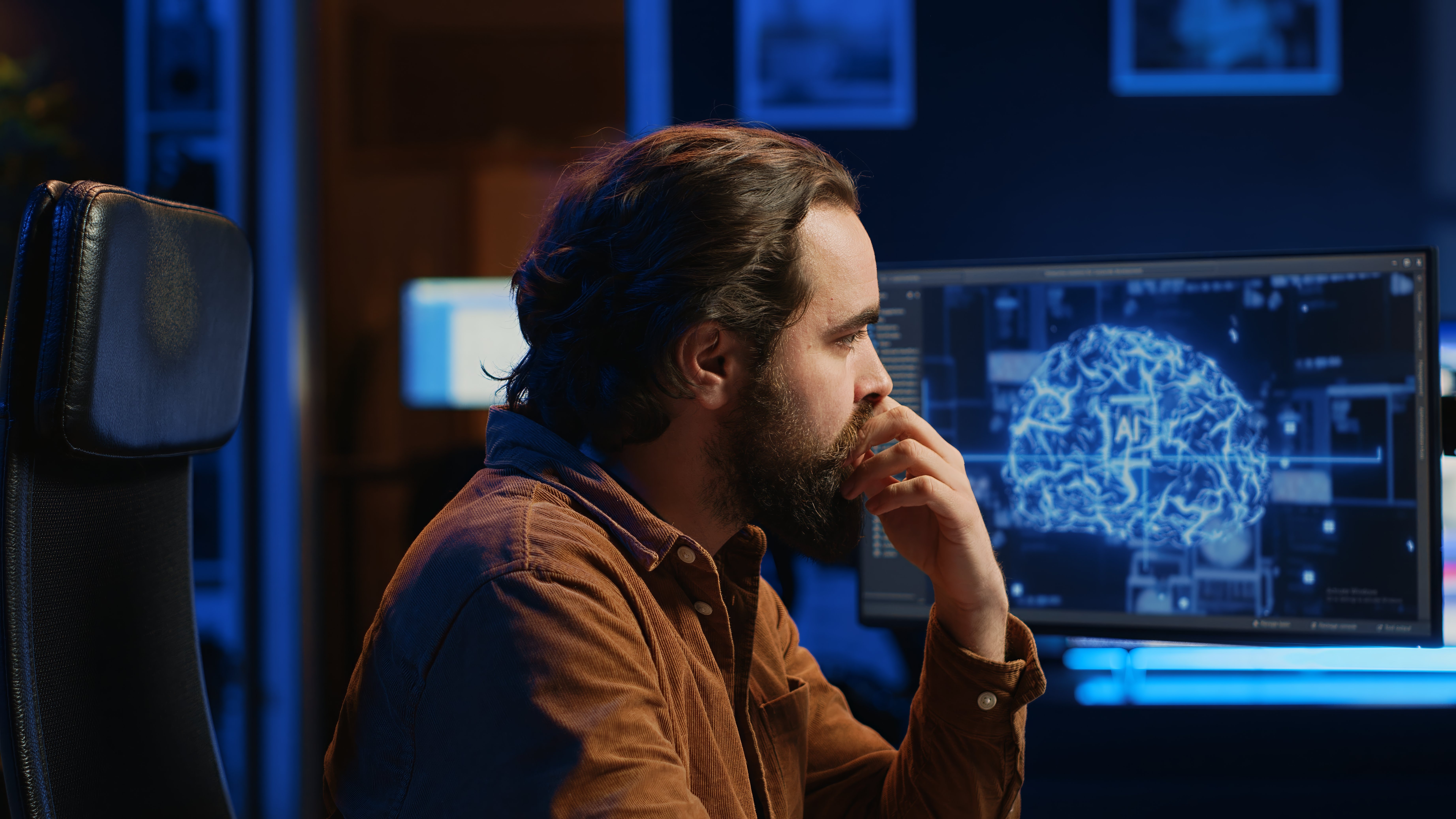 programmer-using-computer-update-ai-neural-networks-drinking-coffee